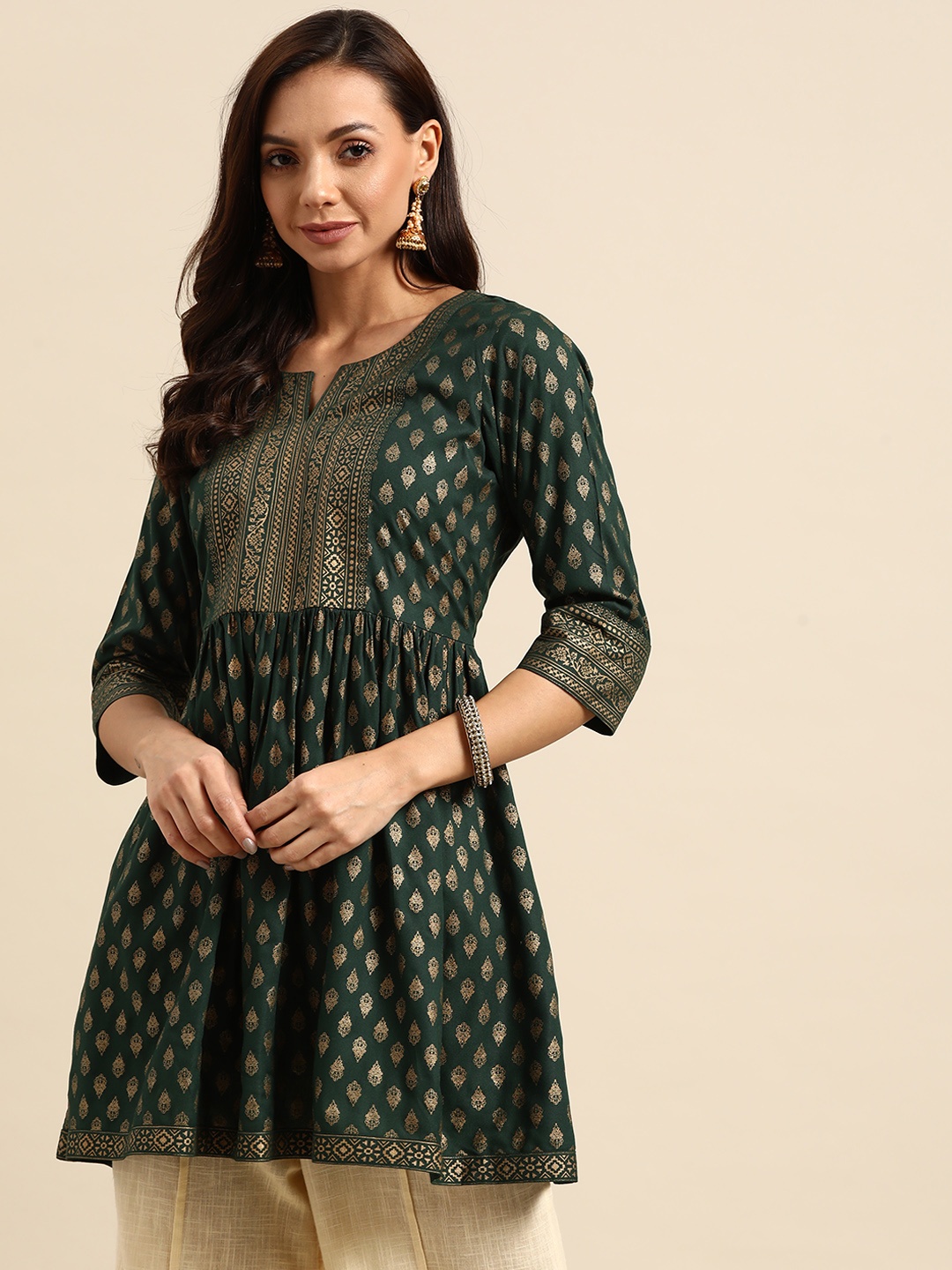 

Gerua By Libas Women Green Golden Ethnic Motifs Printed Pleated Kurti
