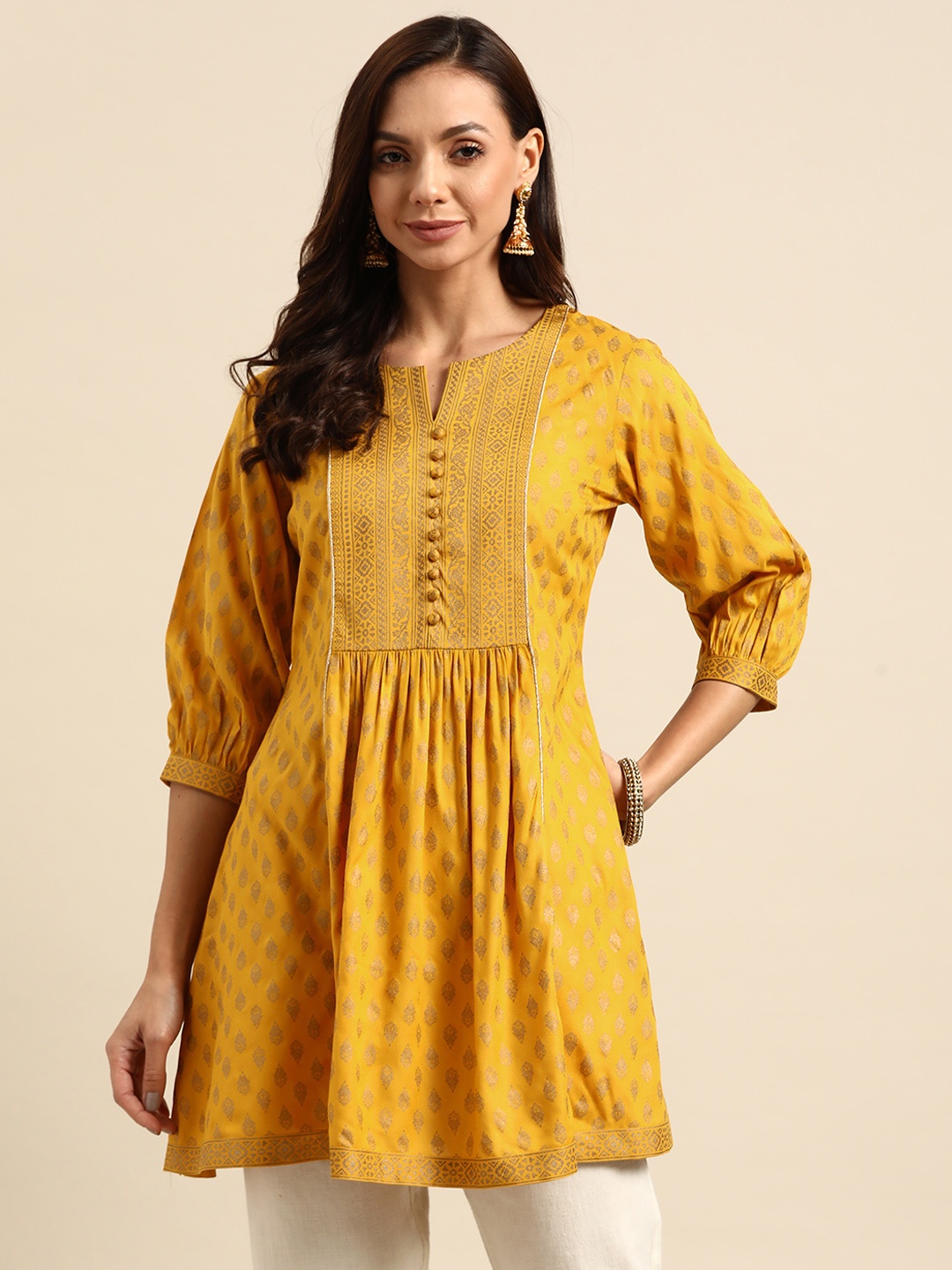 

Gerua By Libas Women Yellow Golden Ethnic Motifs Printed Pleated Kurti