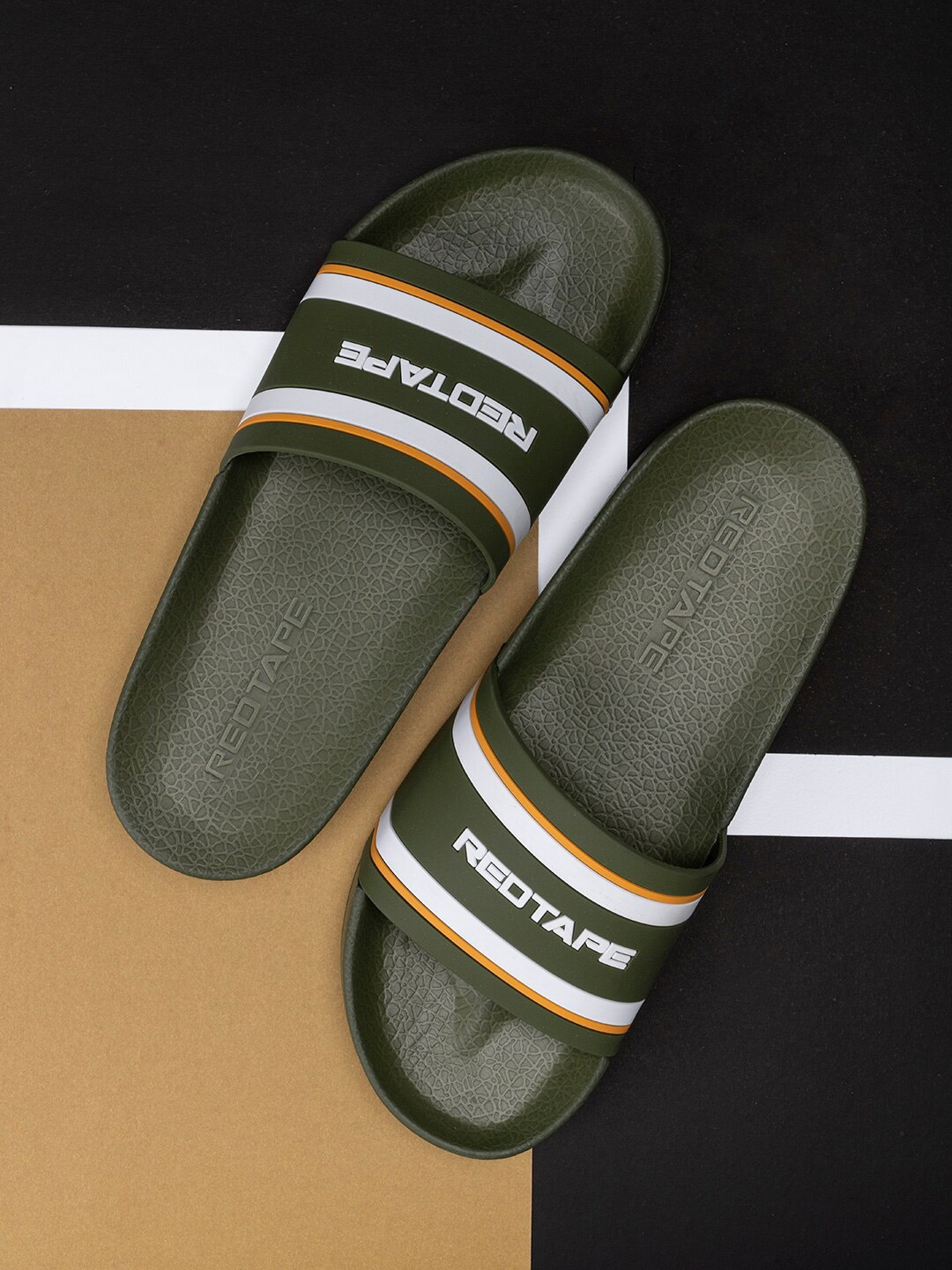 

Red Tape Men Olive Green & White Printed Rubber Sliders