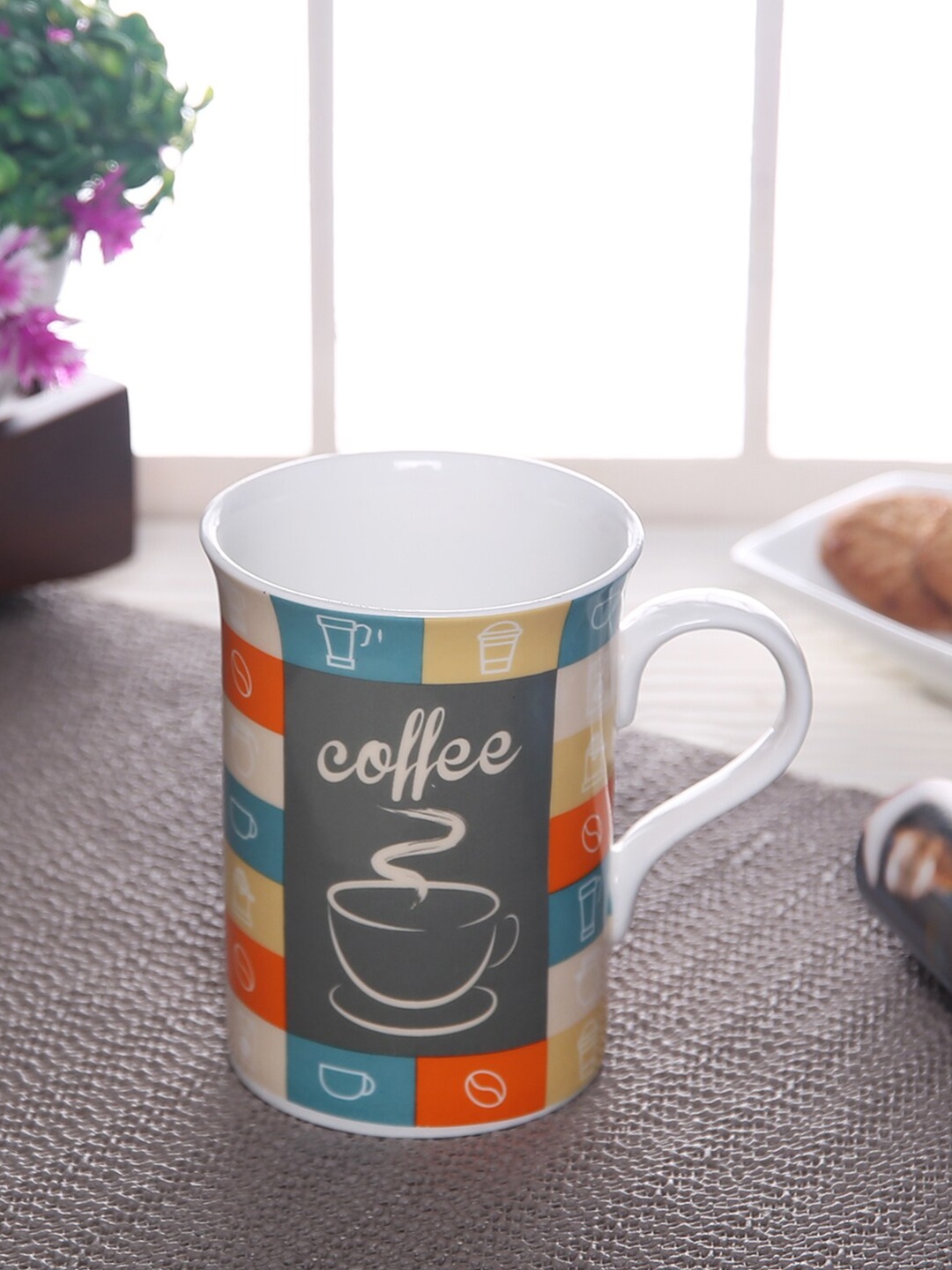 

CLAY CRAFT Blue & Yellow Printed Ceramic Glossy Mug