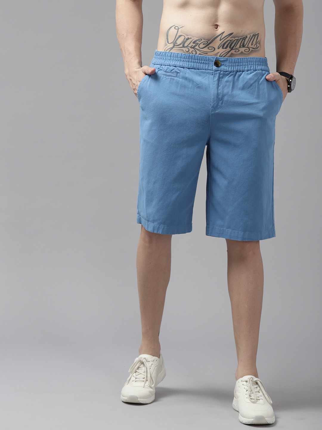 

Roadster Men Blue Solid Woven Shorts