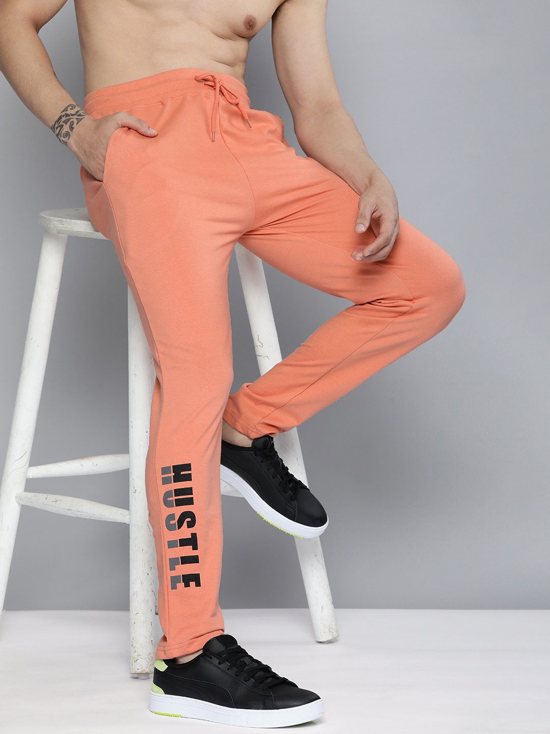 

HERE&NOW Men Navy Peach & Black Printed Pure Cotton Track Pants