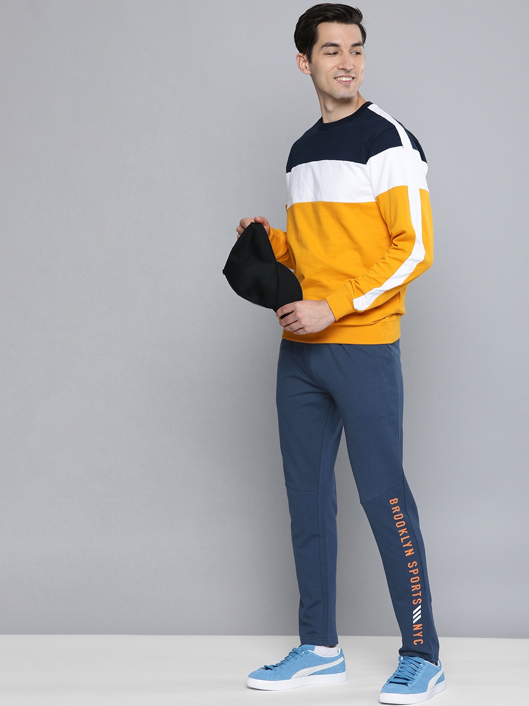 

HERE&NOW Men Navy Blue & Orange Printed Pure Cotton Track Pants