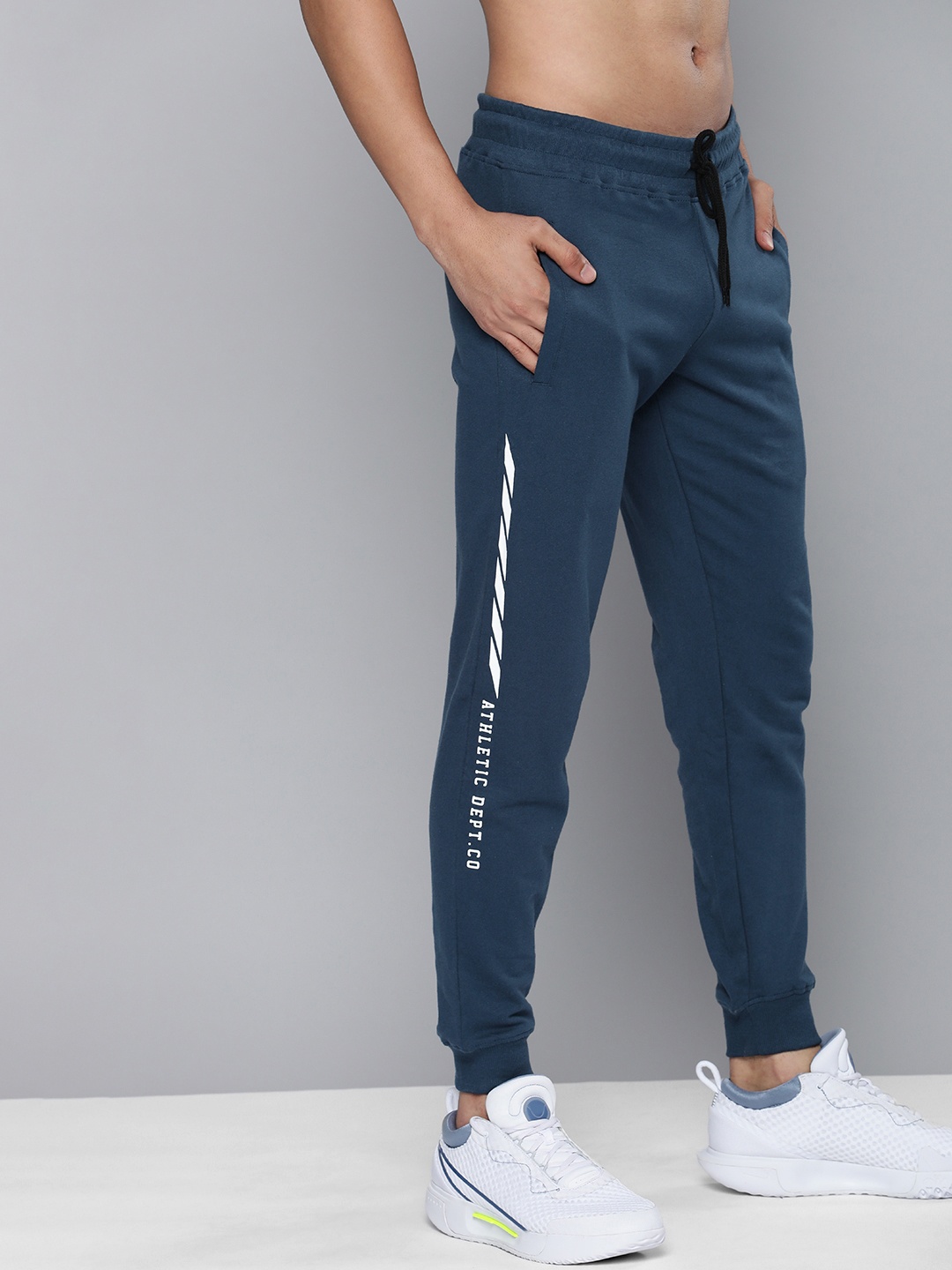 

HERE&NOW Men Teal Blue Solid Regular Fit Joggers with Side Stripe Detail