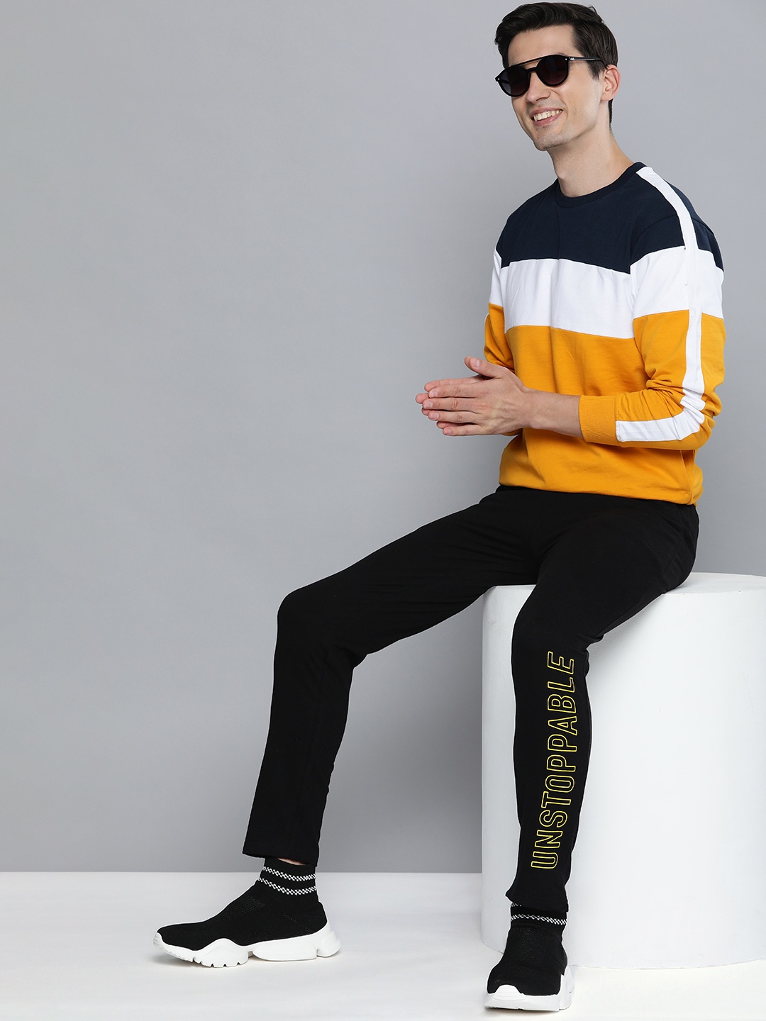 

HERE&NOW Men Black & Yellow Printed Pure Cotton Track Pants