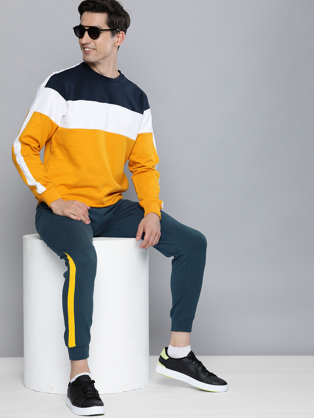 

HERE&NOW Men Navy & Yellow Colourblocked Pure Cotton Joggers, Navy blue