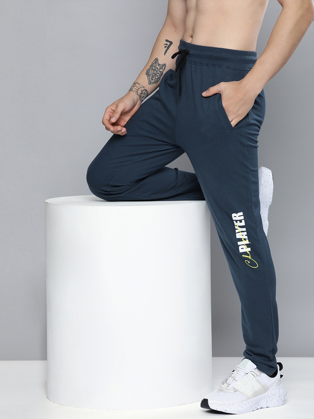 

HERE&NOW Men Navy Blue & White Printed Pure Cotton Track Pants