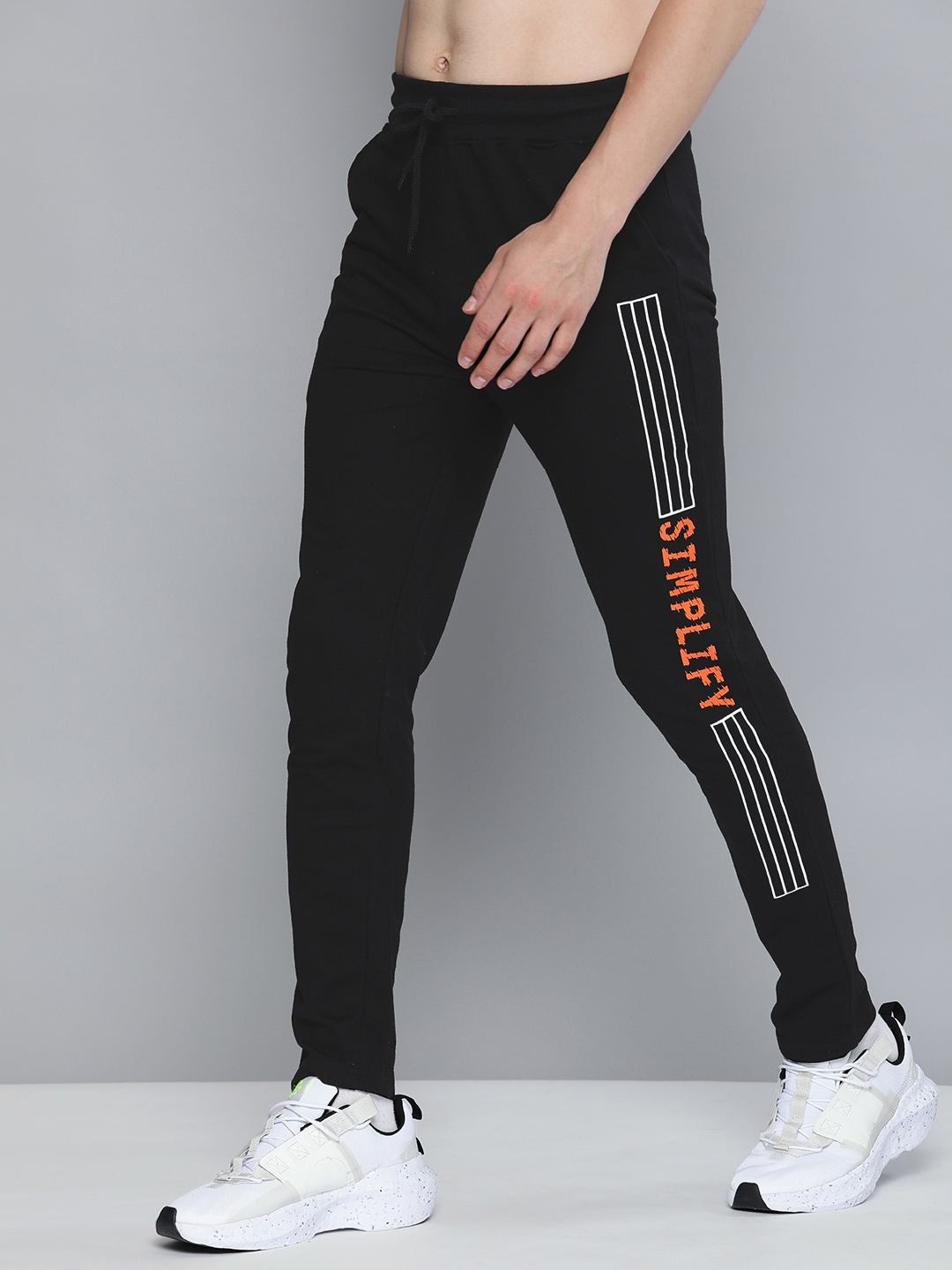 

HERE&NOW Men Black & Orange Printed Pure Cotton Track Pants