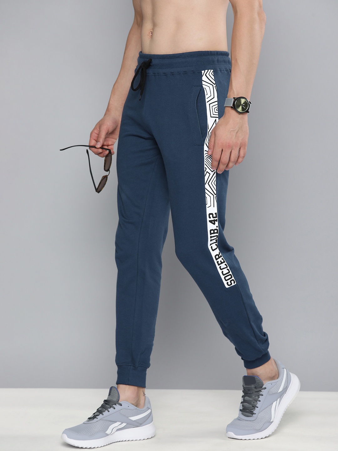

HERE&NOW Men Navy Blue & White Printed Pure Cotton Joggers