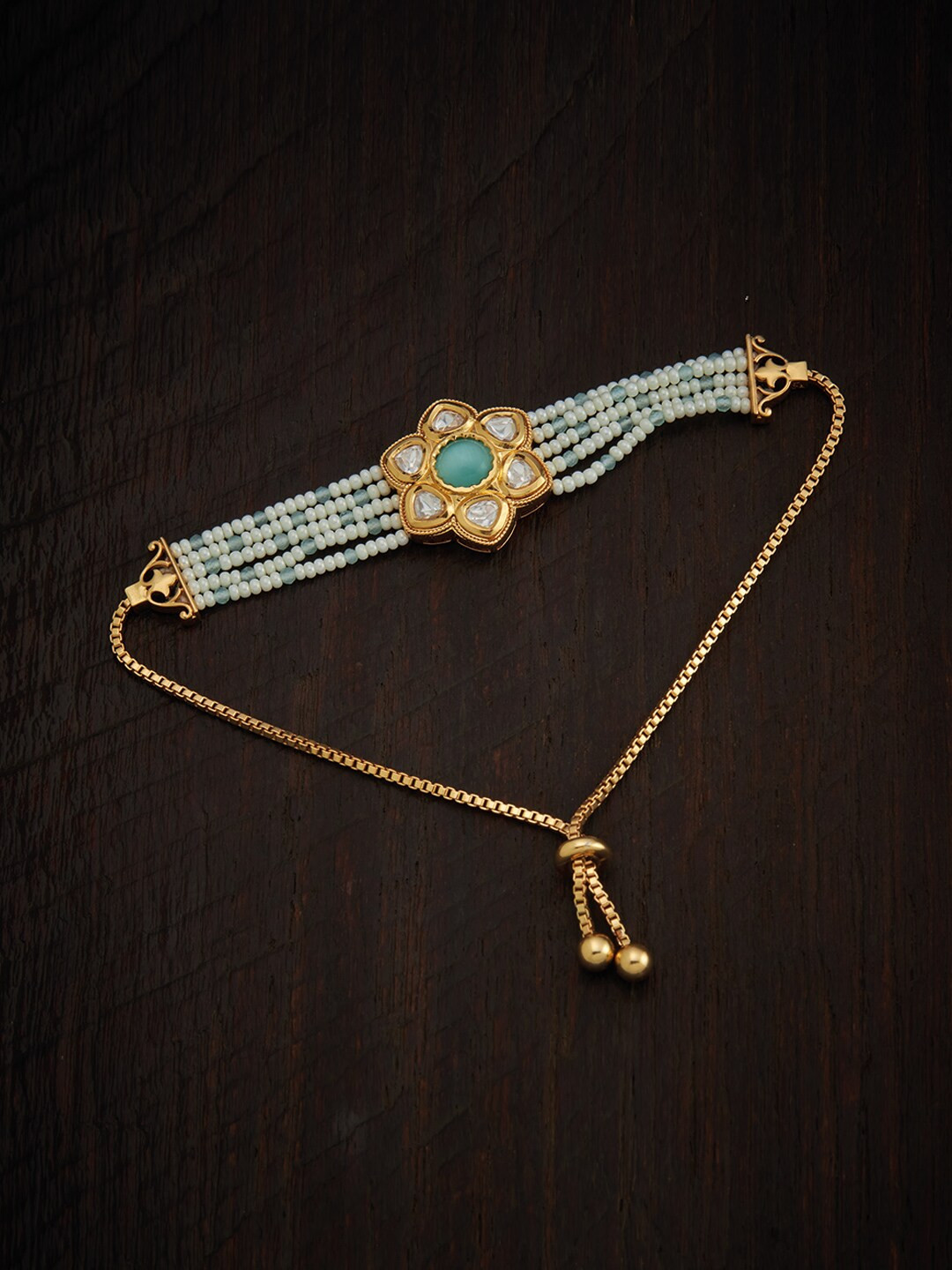 

Kushal's Fashion Jewellery Women Gold-Plated White & Sea Green Kundan Bracelet