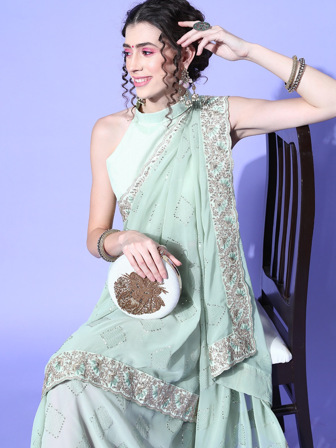

Saree mall Green Sequinned Sarees