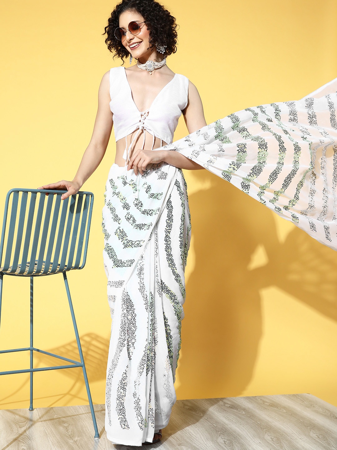 

Mitera White & Silver-Toned Striped Sequinned Saree