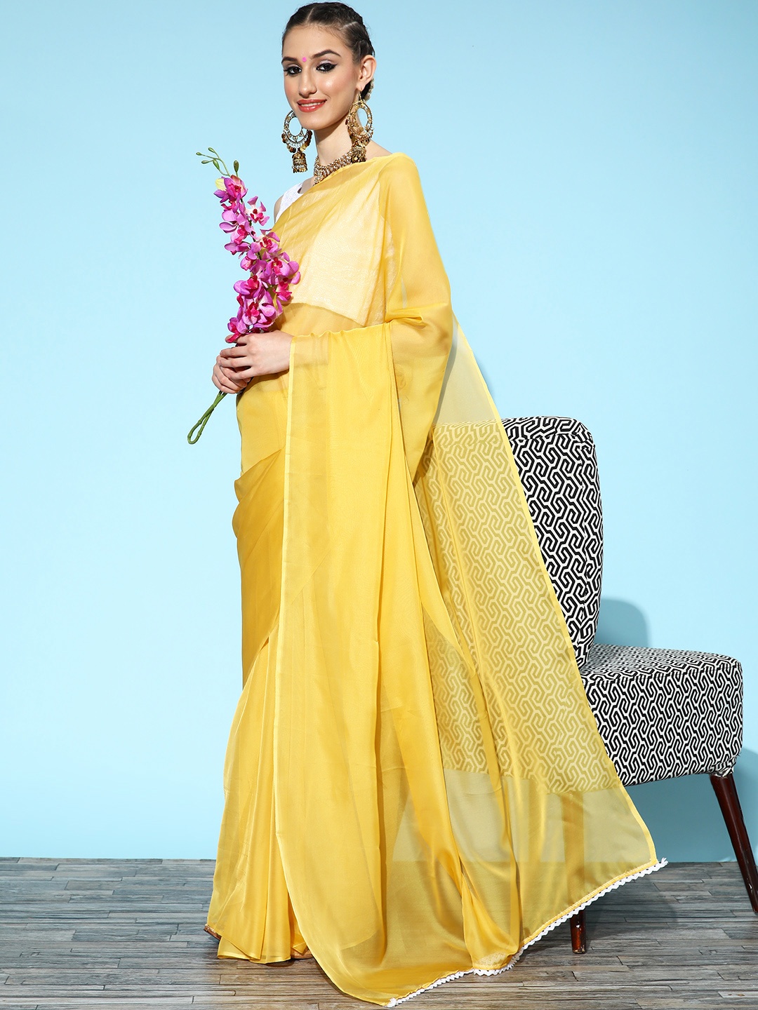 

Saree mall Solid Saree with Embellished Border, Mustard