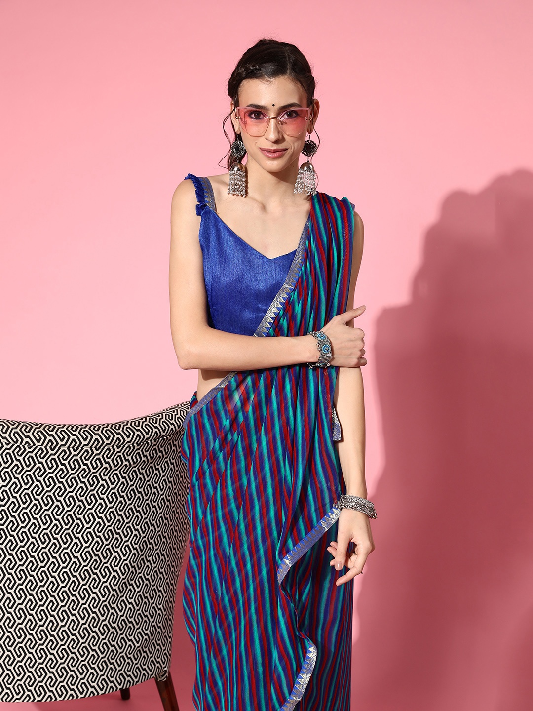 

Mitera Blue & Maroon Striped Saree