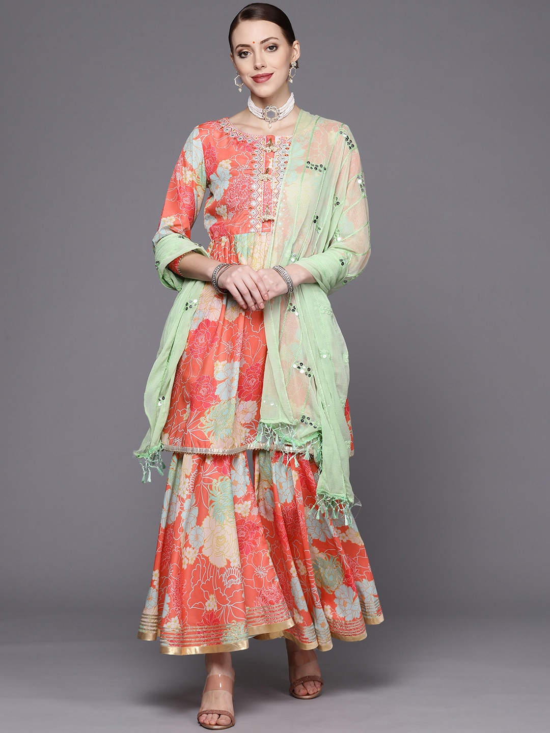 

Varanga Women Coral Floral Printed Empire Mirror Work Kurta with Sharara & With Dupatta