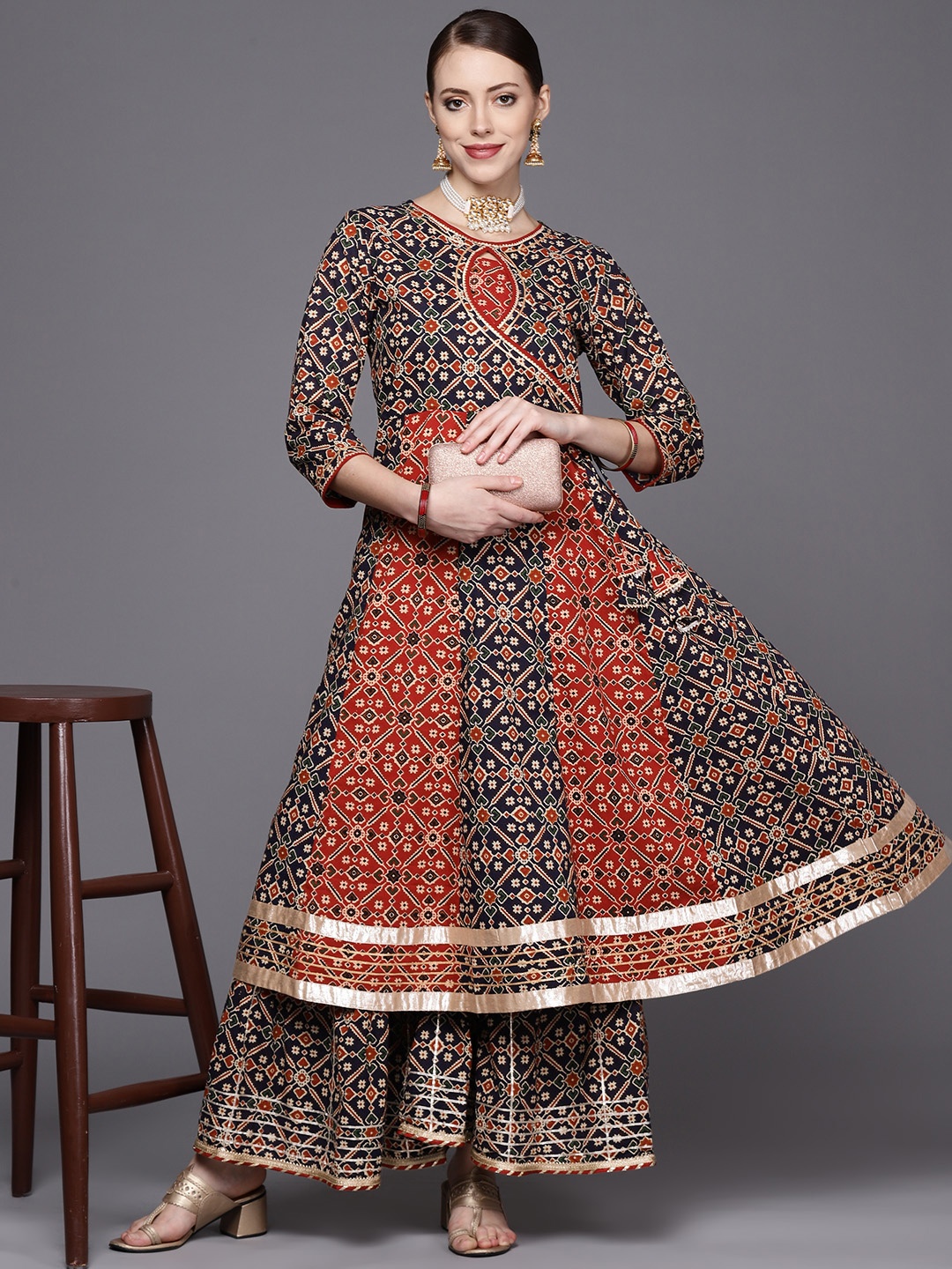 

Varanga Women Blue Ethnic Motifs Printed Panelled Gotta Patti Pure Cotton Kurta with Sharara