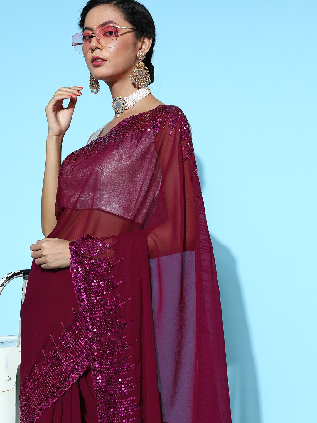

Mitera Maroon Sequinned Saree