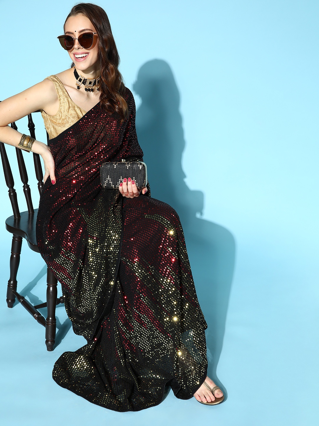 

Mitera Maroon & Green Embellished Sequinned Saree