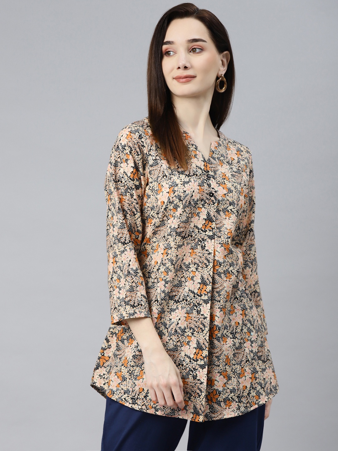 

Ayaany Black & Peach-Coloured Floral Printed Cotton Tunic