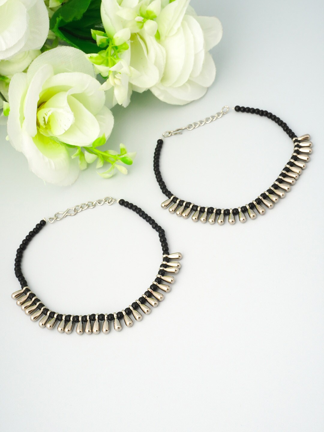 

Urmika Oxidised Black & Silver-Toned Beaded Anklets