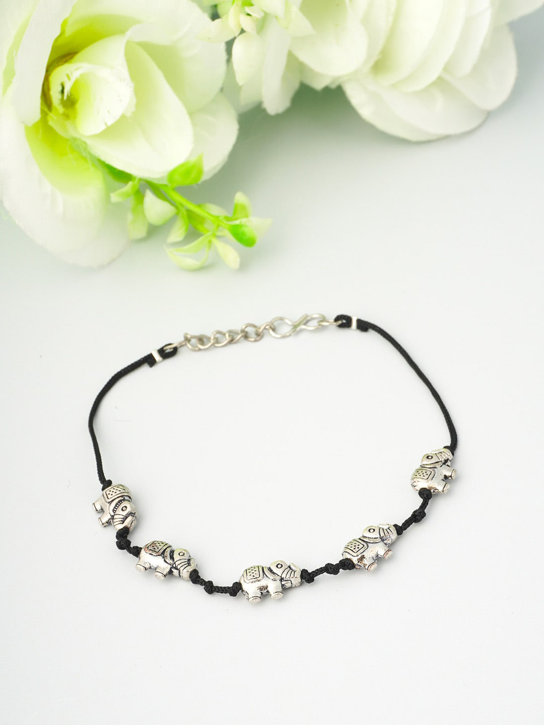 

Urmika Women Oxidised Black & Silver Elephant Thread Anklet