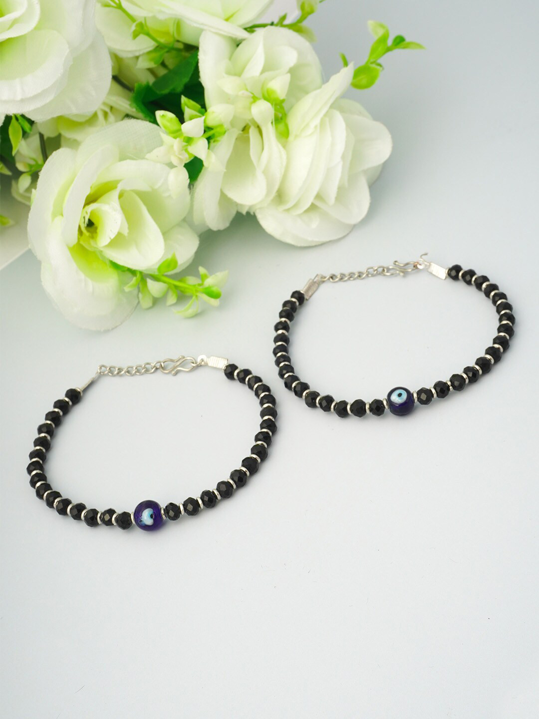 

Urmika Women Set of 2 Black & Blue Beaded Evil Eye Anklets