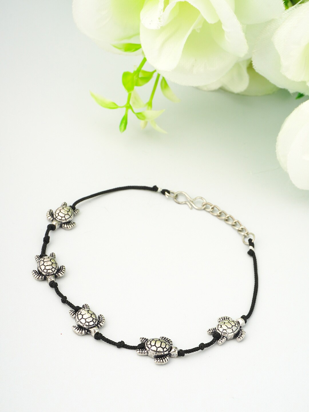 

Urmika Women Oxidised Black & Silver Turtle Thread Anklet