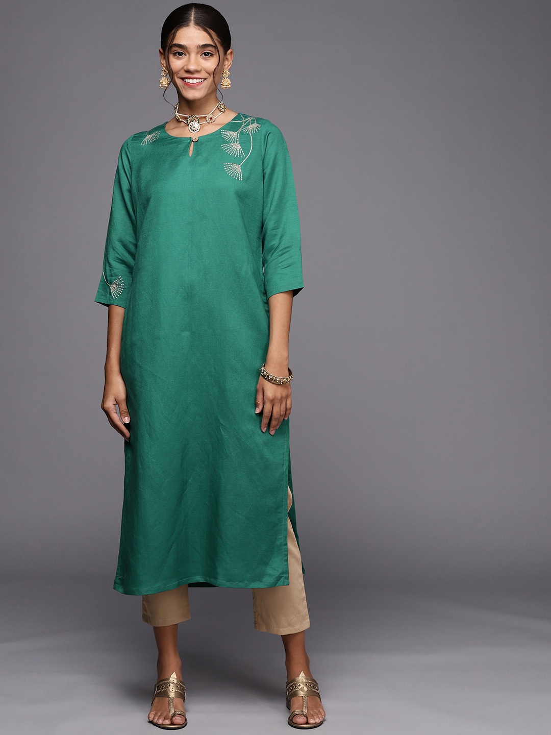 

PINKSKY Women Green Floral Embroidered Thread Work Pure Cotton Kurta with Trousers