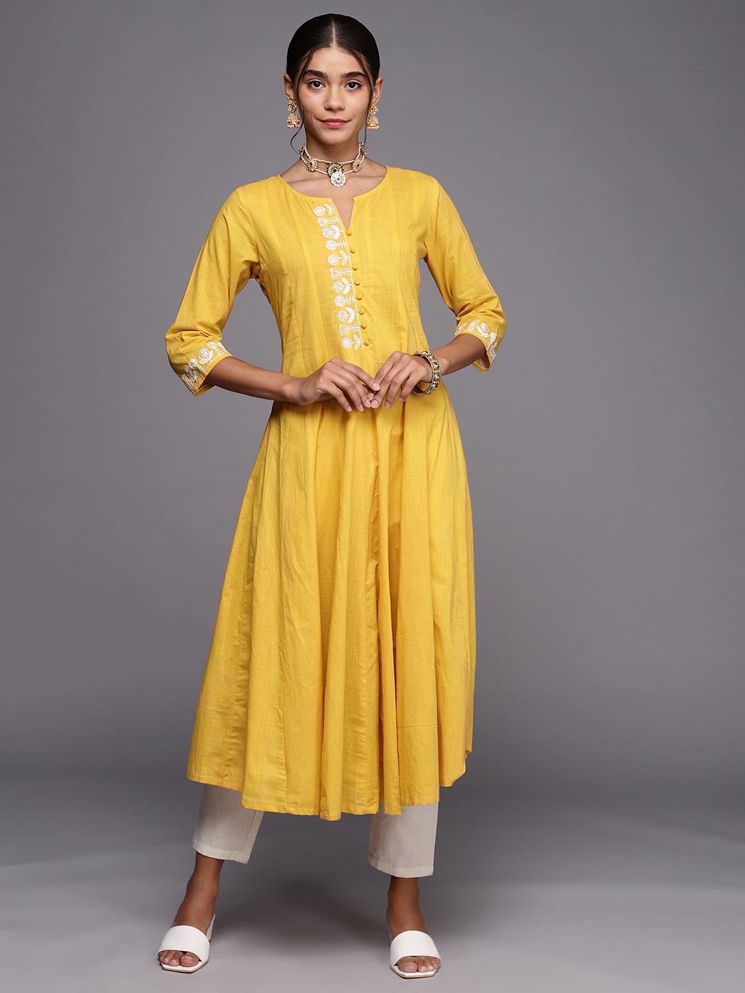 

PINKSKY Women Yellow Ethnic Embroidered Pure Cotton Kurta with Trousers
