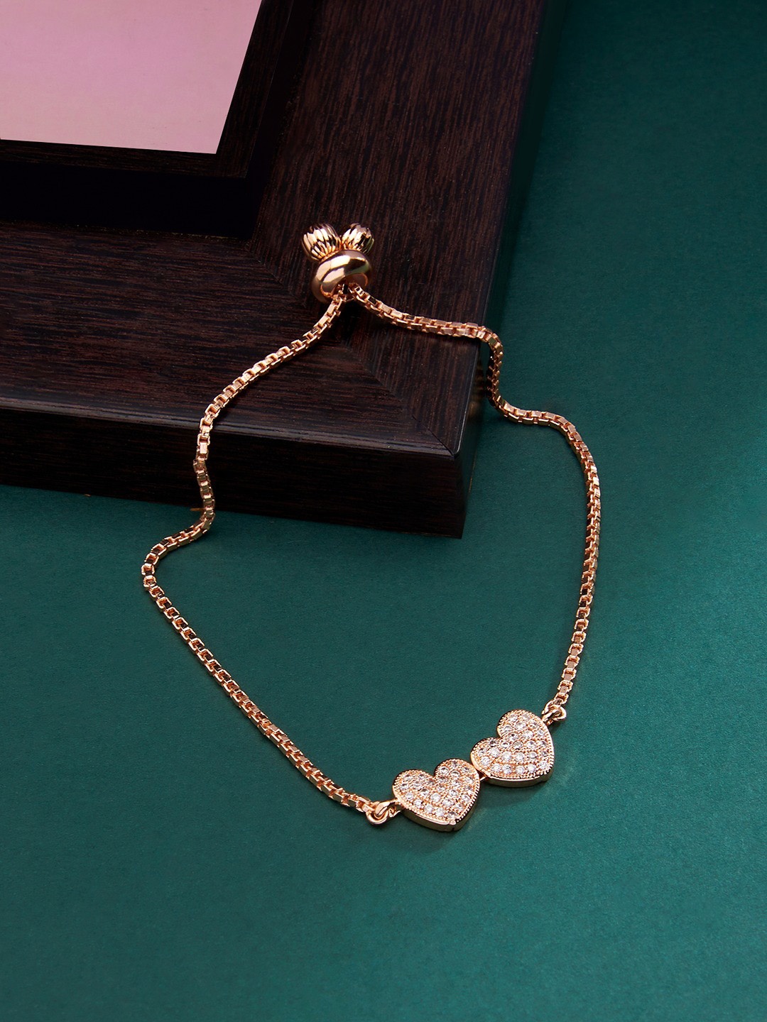

AMI Women Rose Gold Brass Cubic Zirconia Studded Charm Bracelet