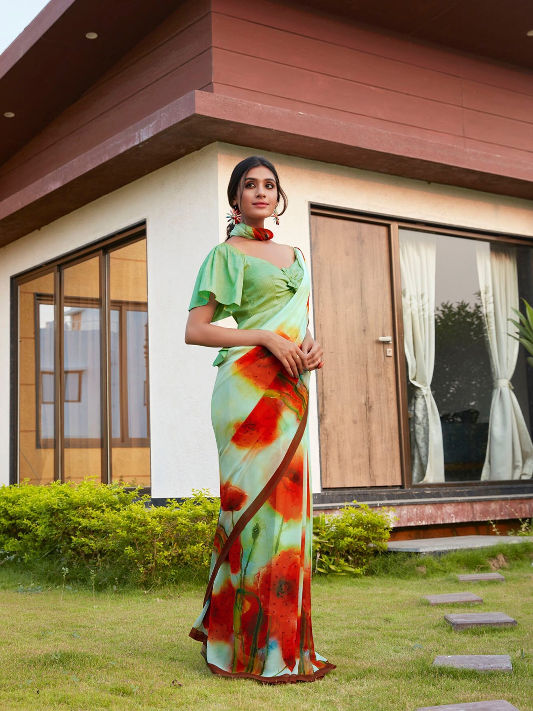 

Shaily Green & Orange Floral Pure Georgette Saree