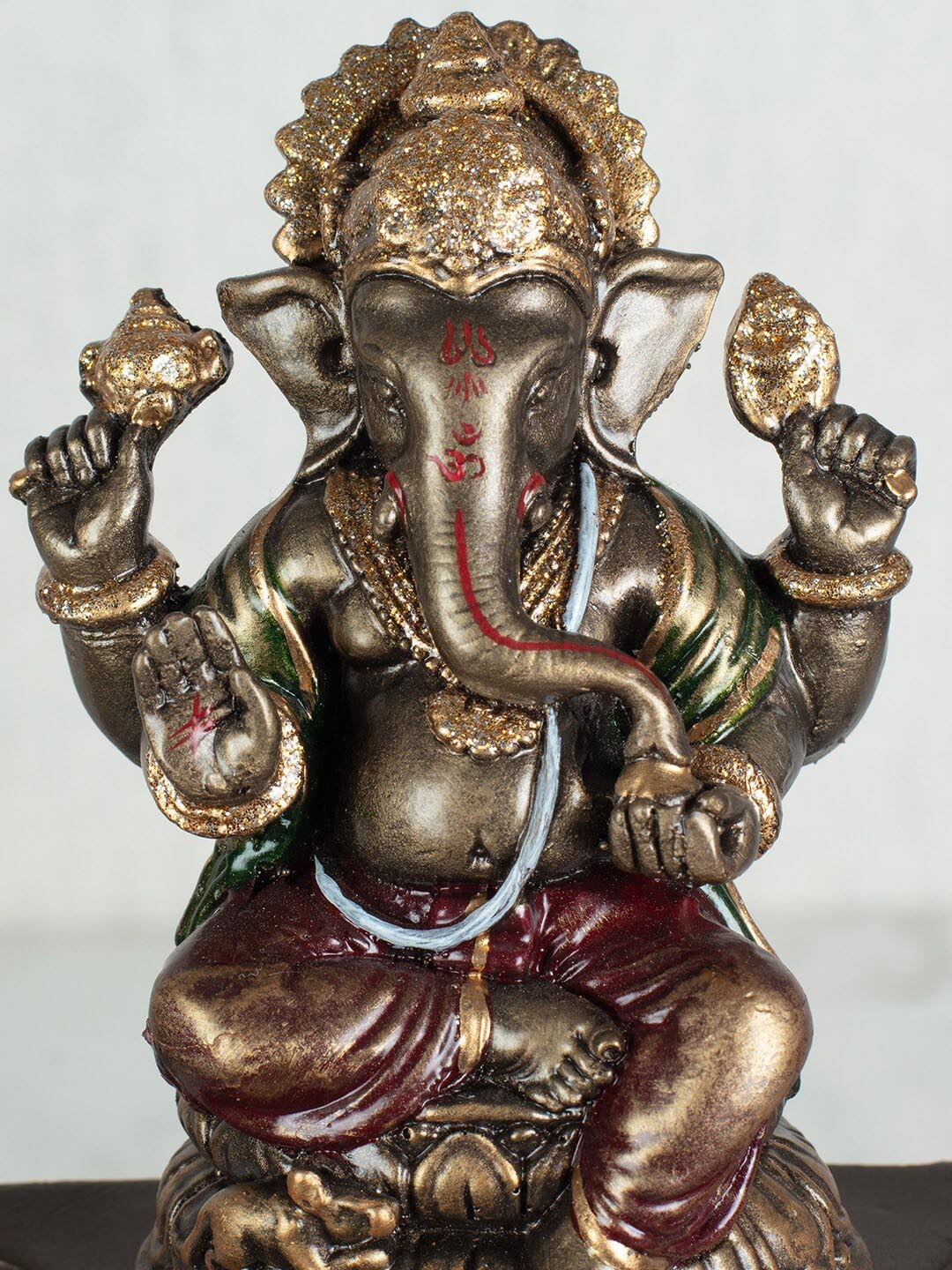 

HomeTown Bronze Polyresin Embellished Dynast Ganesha Hand Finished Figurine