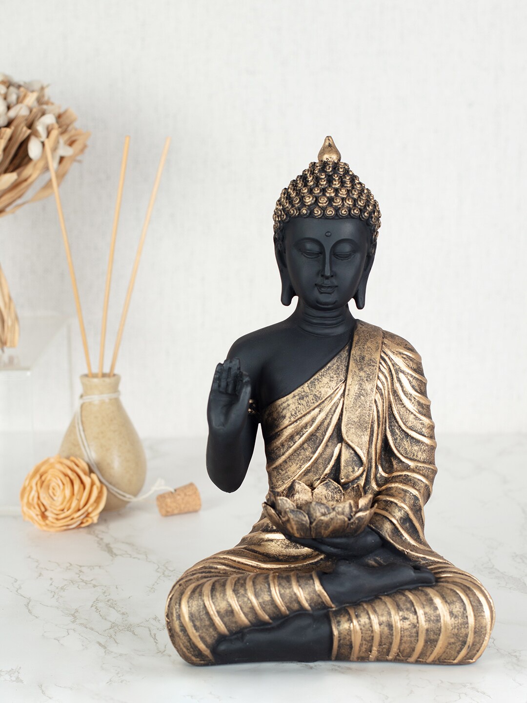 

HomeTown Black & Gold-Toned Buddha Showpiece Cum Tealight Holder