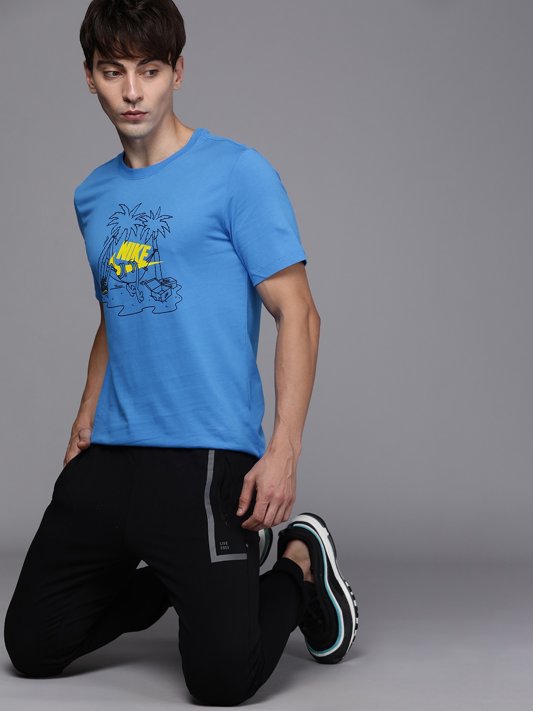 

Nike Men Blue & Multicoloured Graphic Printed SPTCAS T-shirt