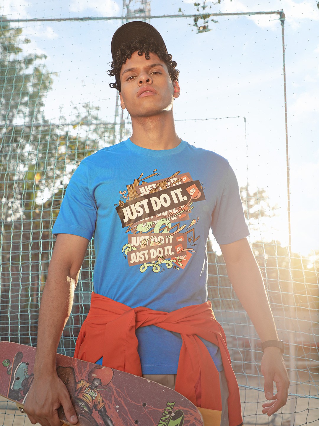 

Nike Men Blue & Brown Printed JDI ILLUSTRATION Pure Cotton T-shirt