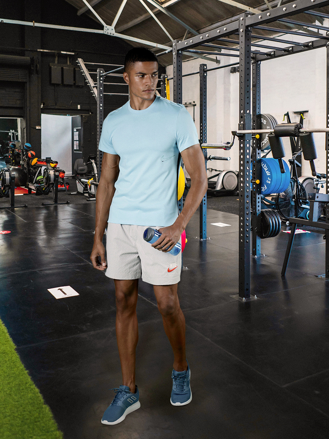 

Nike Men Blue & Navy Blue Brand Logo Printed Dri-FIT Training or Gym T-shirt