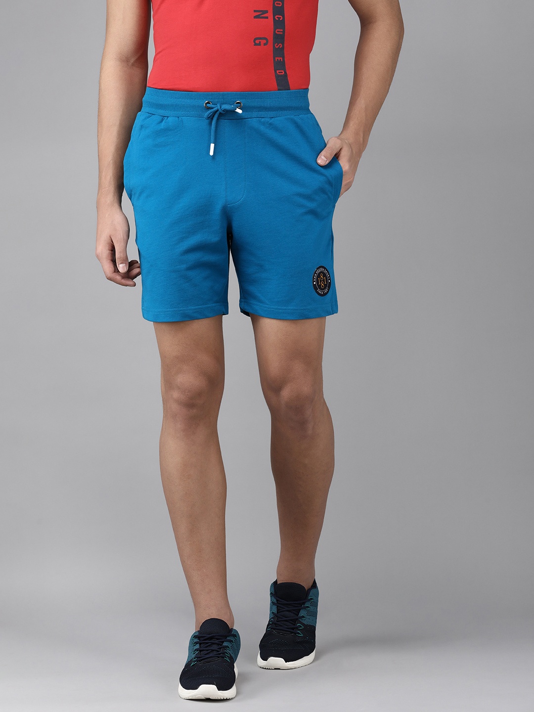 

Van Heusen Sport Men Teal Blue Solid Mid Rise Casual Shorts
