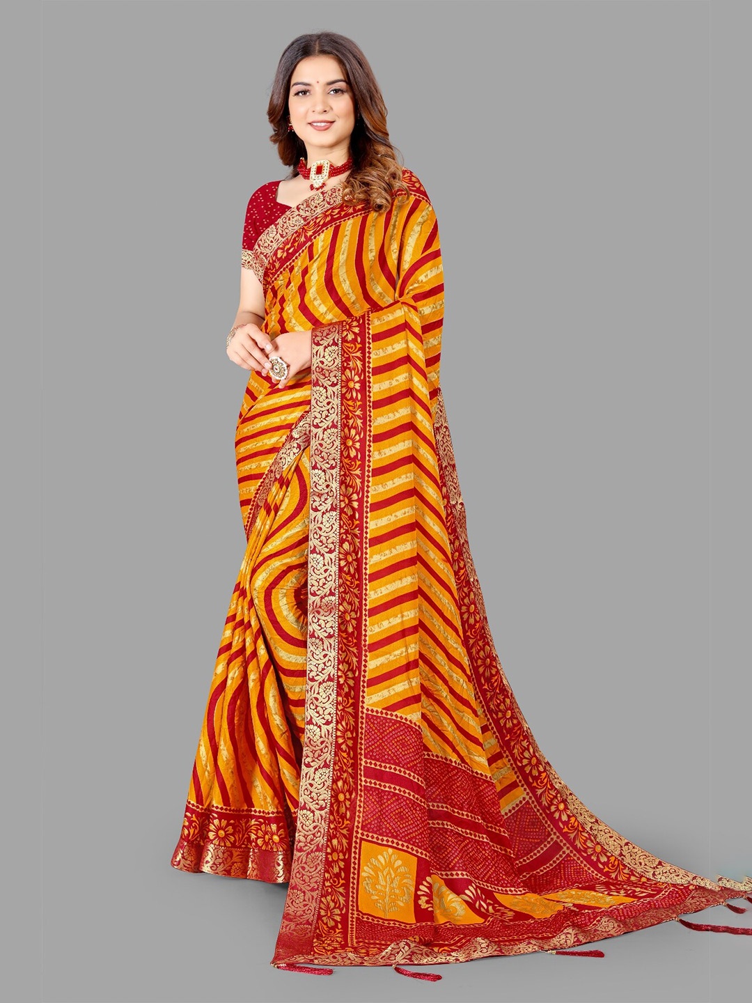 

LAHEJA Orange & Red Striped Ploy Silk Saree