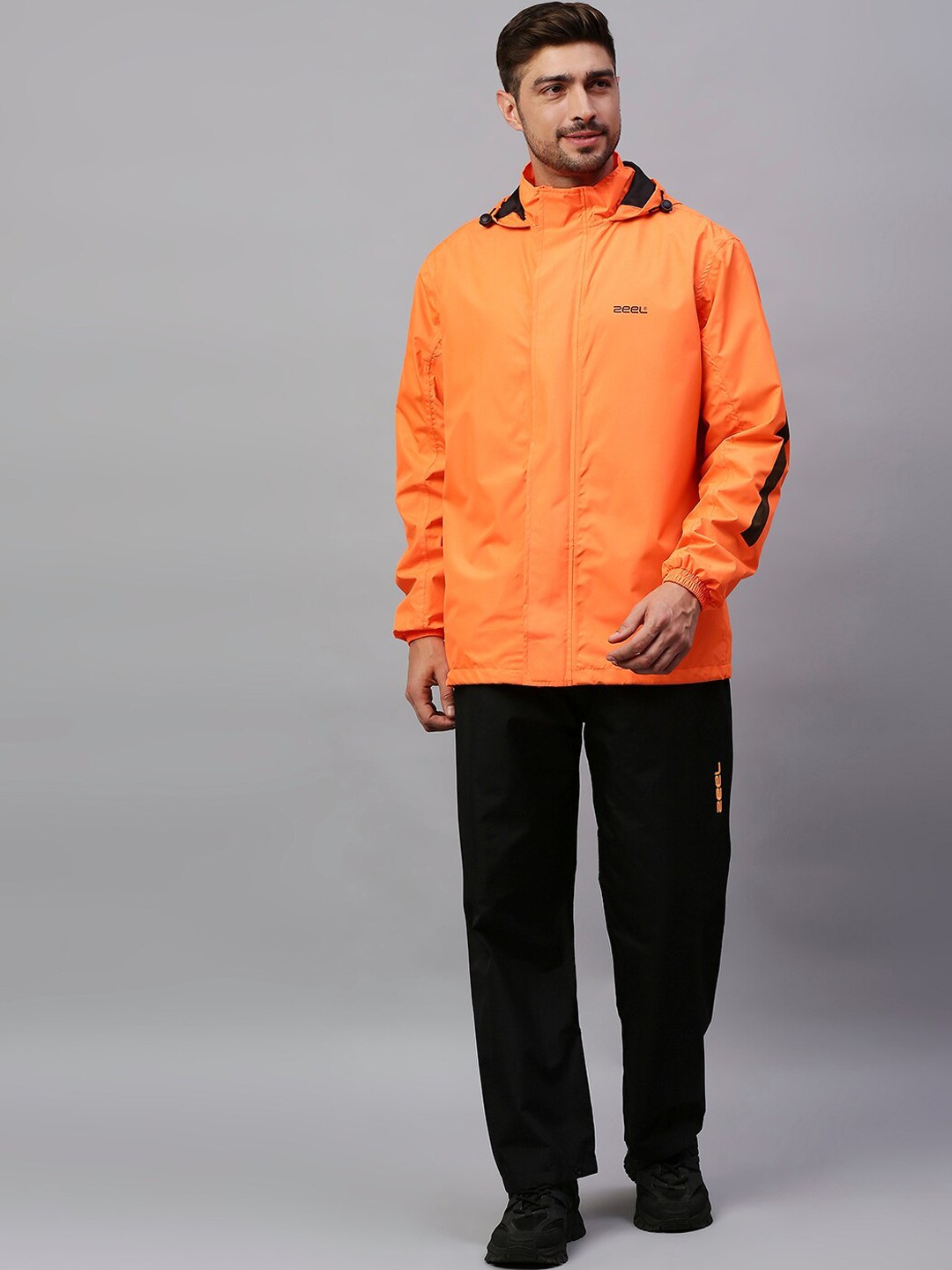 

Zeel Men Orange & Black Solid Rain Suit