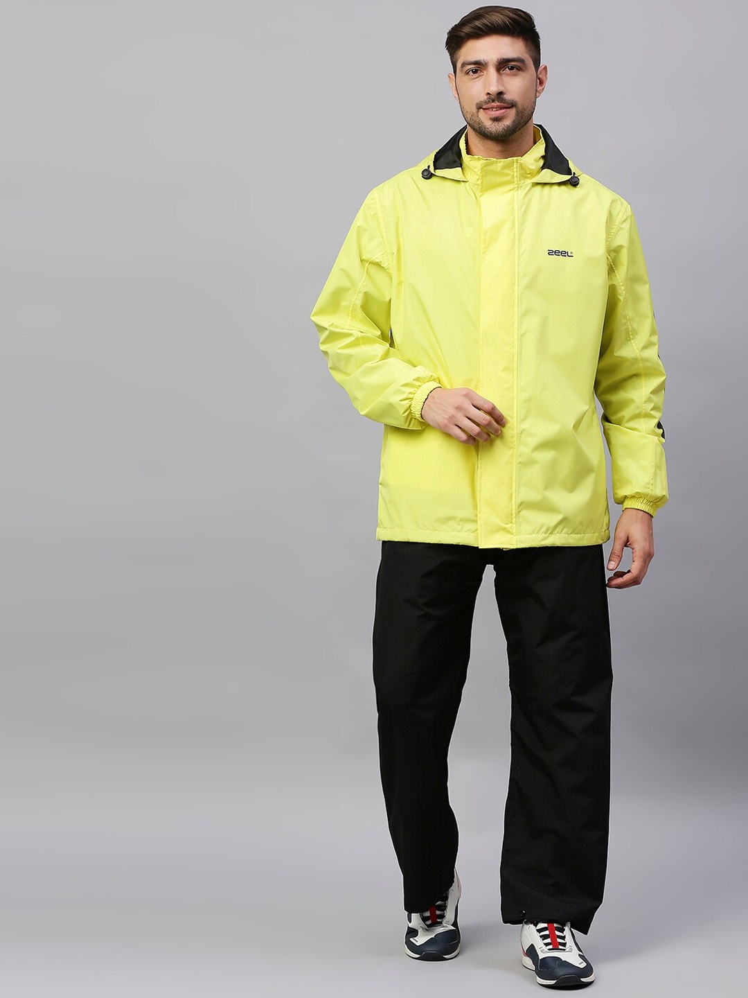 

Zeel Men Yellow & Black Solid Rain Suit