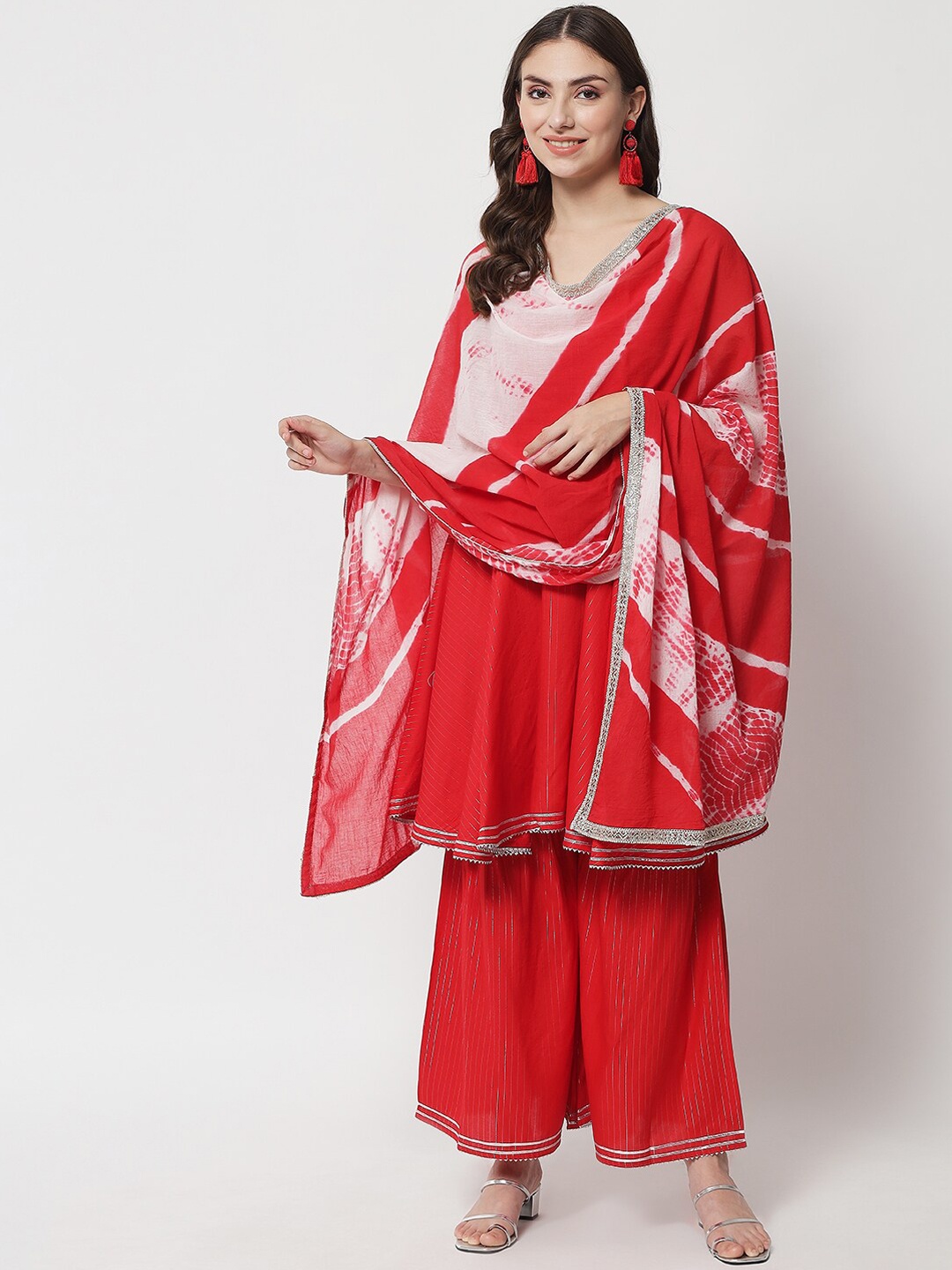 

IkDaiya Women Red Striped Empire Kurta with Palazzos & With Dupatta