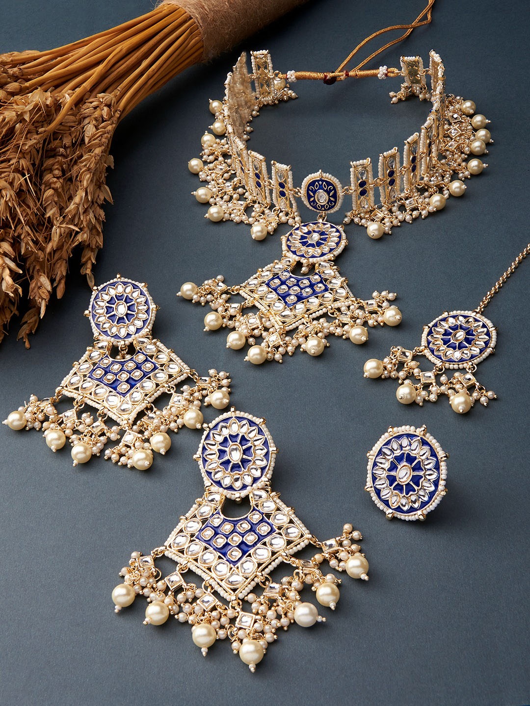 

Zaveri Pearls Gold-Plated Blue & White Kundan & Pearls Meenakari Jewellery Set