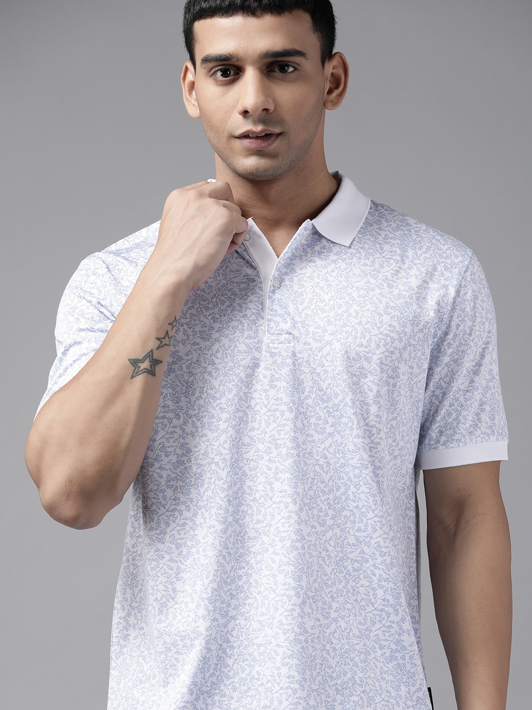 

Van Heusen Men White & Blue Floral Printed Polo Collar Pure Cotton T-shirt