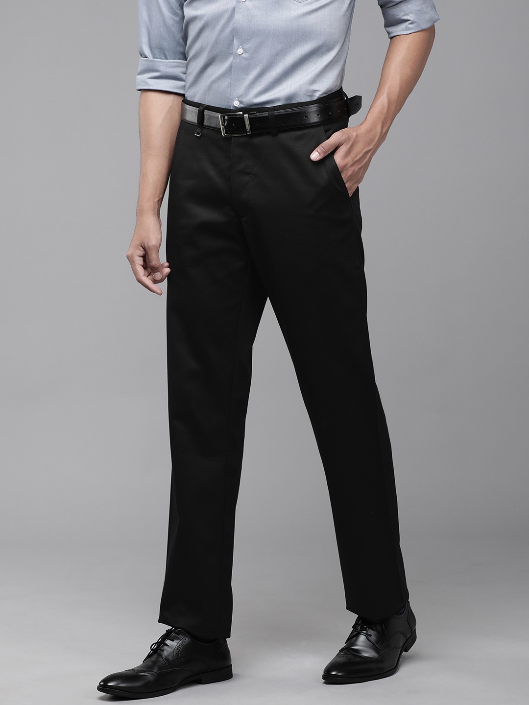 

Van Heusen Men Black Solid Trousers