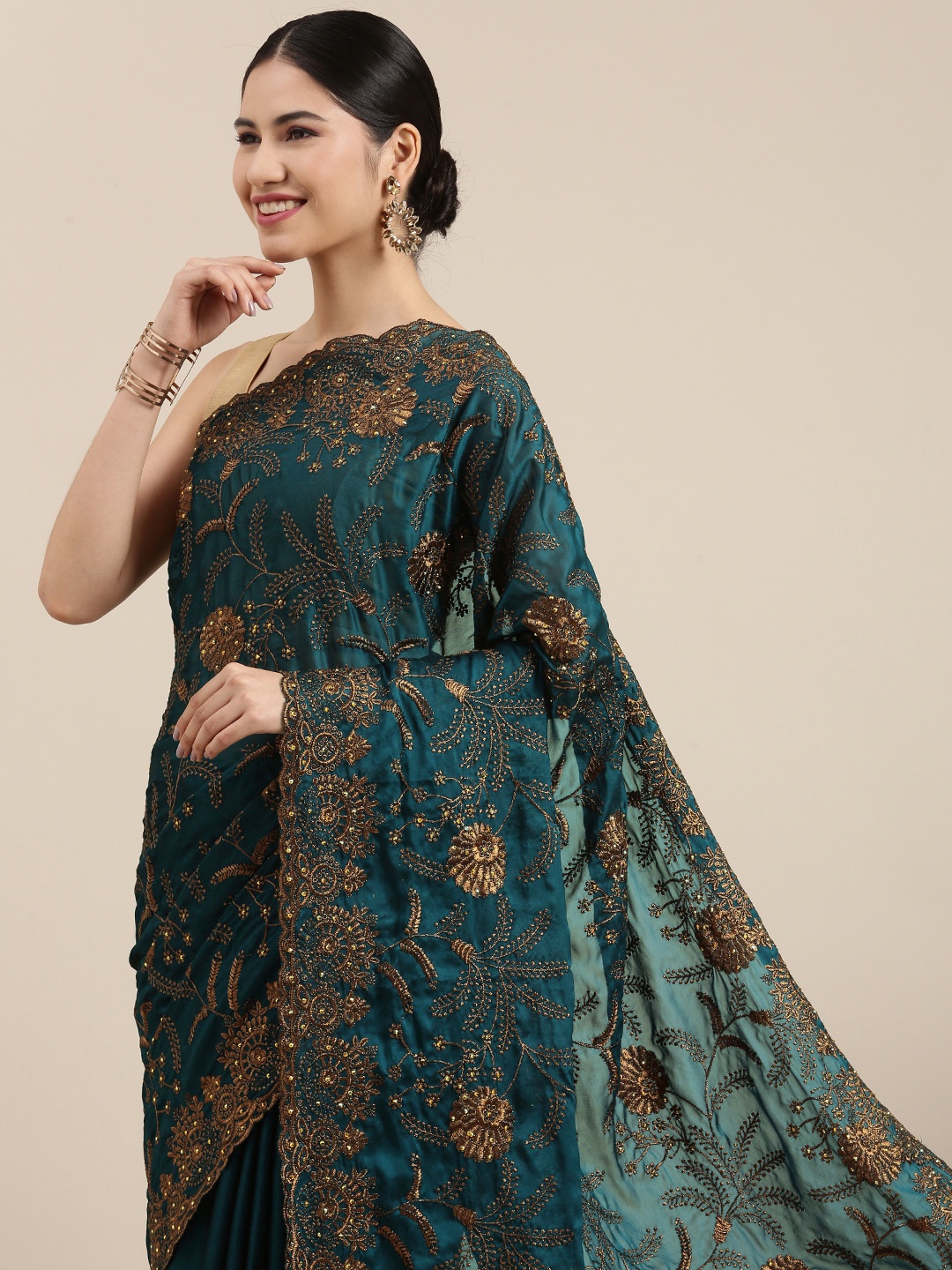 

Pothys Teal & Copper Floral Embroidered Pure Chiffon Saree