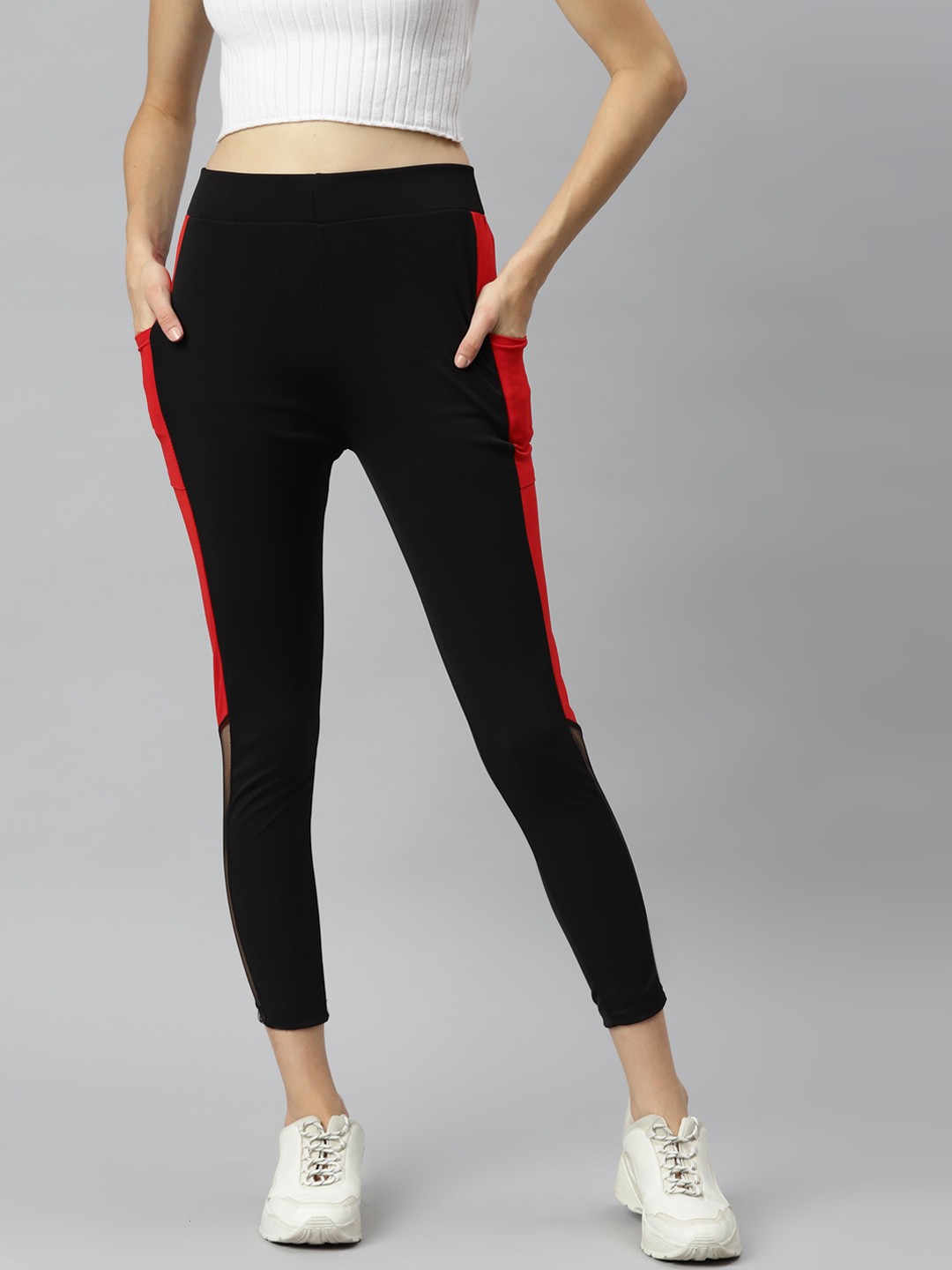 

Aarika Women Black Solid Mesh Detail Track Pants