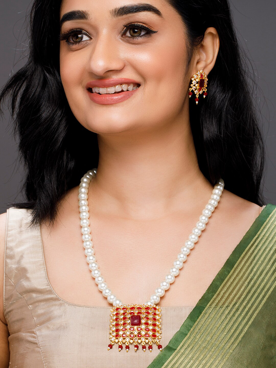 

Anouk Gold-Plated & Red Stones-Studded & Pearls Beaded Jewellery Set