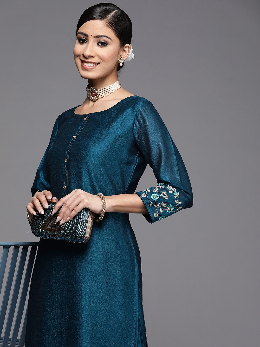 

Libas Women Teal Thread Work Pastels Kurta