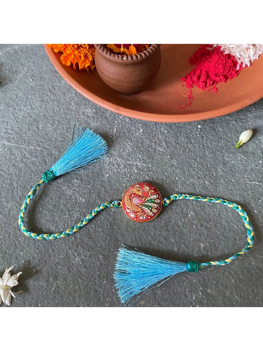 

Mitali Jain Orange & Blue Handcrafted Rakhi