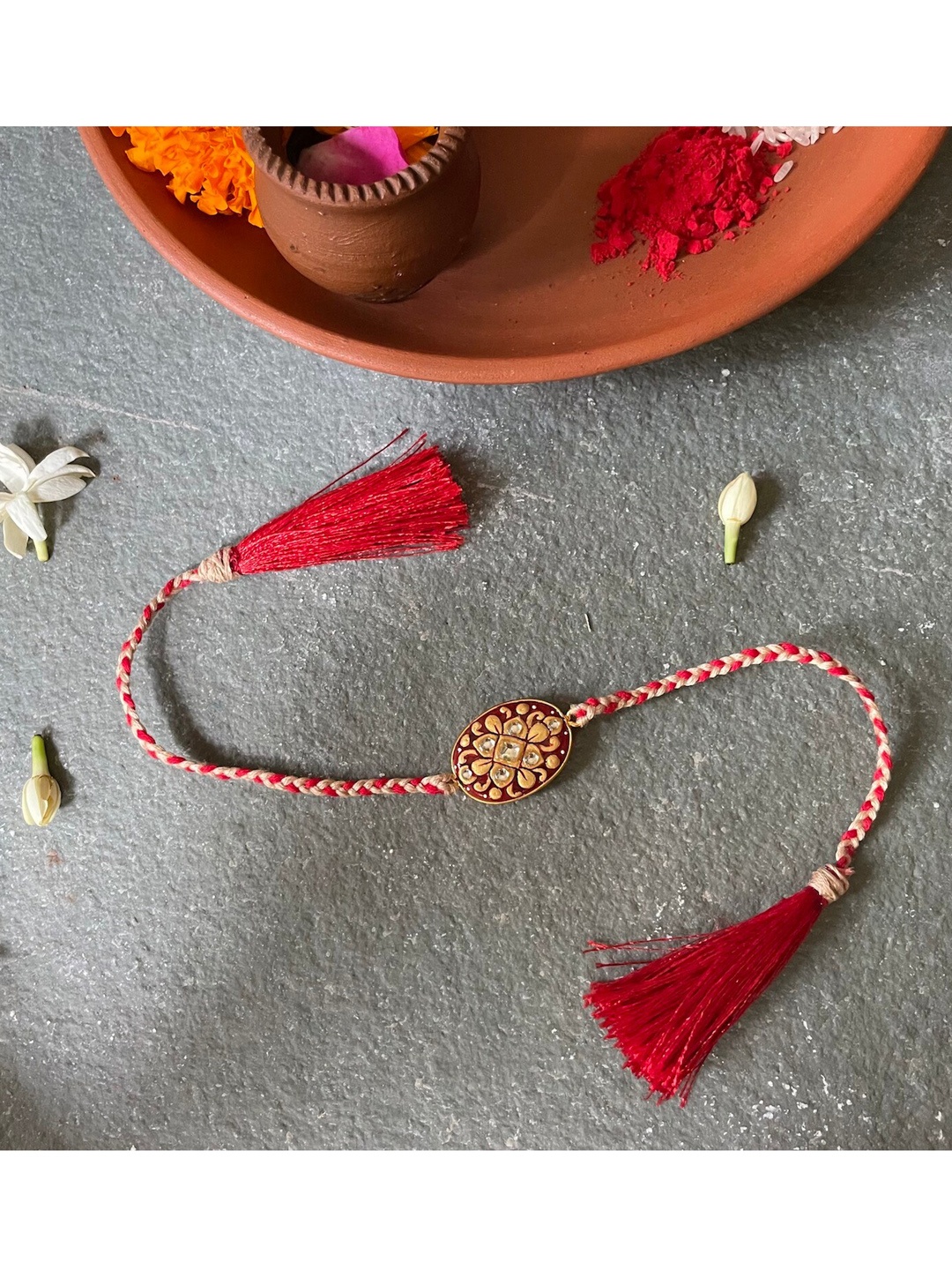 

Mitali Jain Men Red & Stone Studded Rakhi